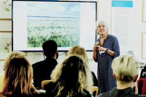 A picture of Nicola Davies presenting a brilliant keynote speech at the RENEW X BookTrust Biodiversity Storytelling Summit 2023.