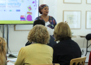 A picture of Nazneen Ahmed Pathak delivering a presentation.
