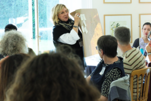 A picture of Cordelia Spalding delivering a presentation