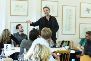 A picture of Paul Linnet delivering a speech.