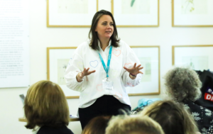 A picture of Claire Goodall engaging a group of people at the RENEW X BookTrust Biodiversity Storytelling Summit 2023.