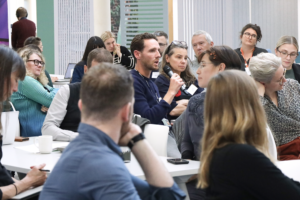 An image of David Bavin asking the panel questions.