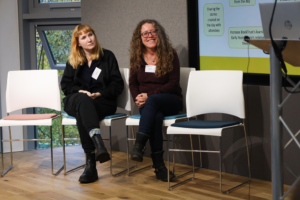 An image of Bethan Stagg and Lucy Mercer at the Biodiversity Parliament 2023.