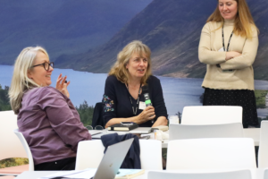An image of Rosie Hails, Emma Zimmerman and Catriona McKinnon at the Biodiversity Parliament 2023.