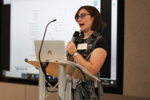 An image of Jo Garret giving a presentation.