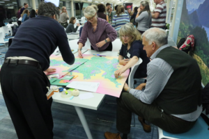 An image of Kevin Gaston, Rosie Hails, Catriona McKinnon and John Wedgwood Clarke collaborating on a workshop task.