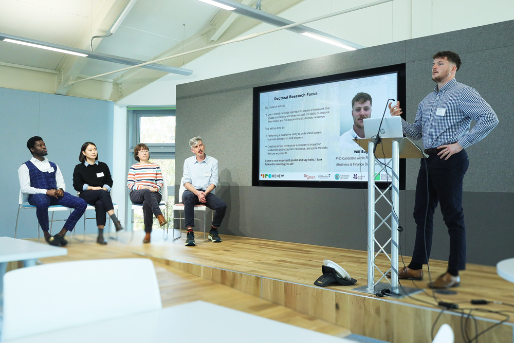 An image of Will Bugg delivering a speech.