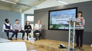 An image of Maria Eugenia Correa Cano delivering a speech.