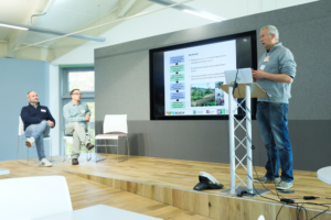 An image of Ilya Maclean delivering a research at the Biodiversity Parliament 2023.