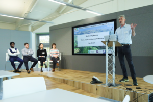 An image of Ben Groom delivering a presentation at the Biodiversity Parliament 2023.