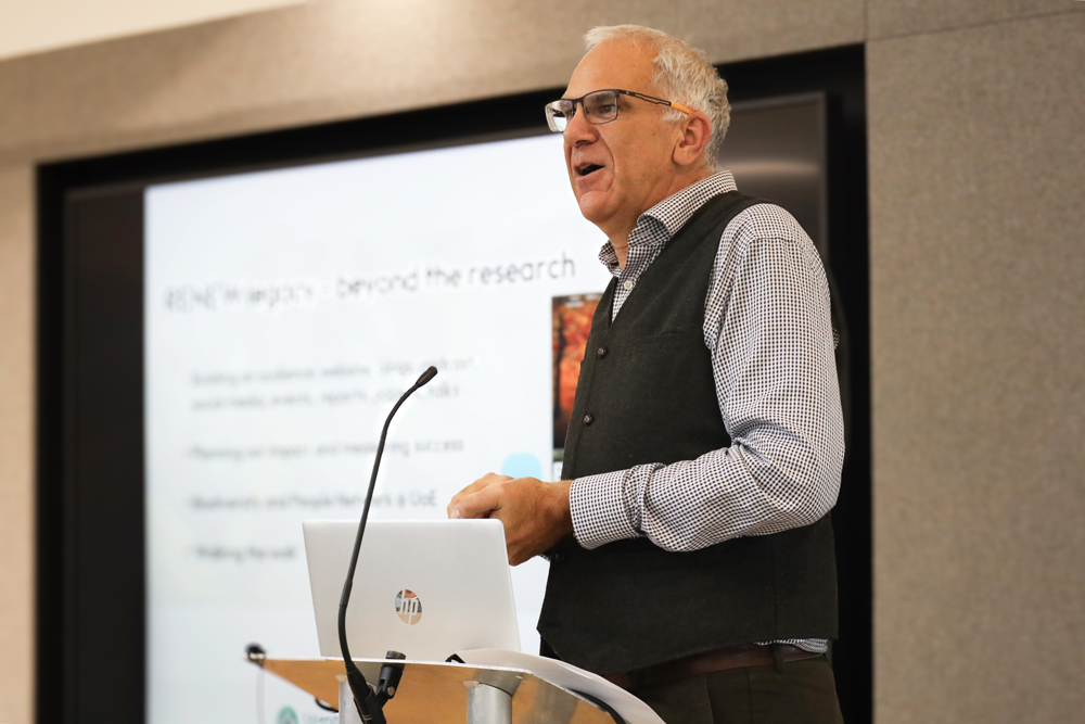 An image of Kevin Gaston delivering a speech.