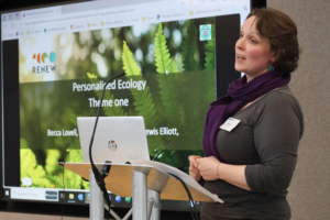 An image of Rebecca Lovell giving a presentation.